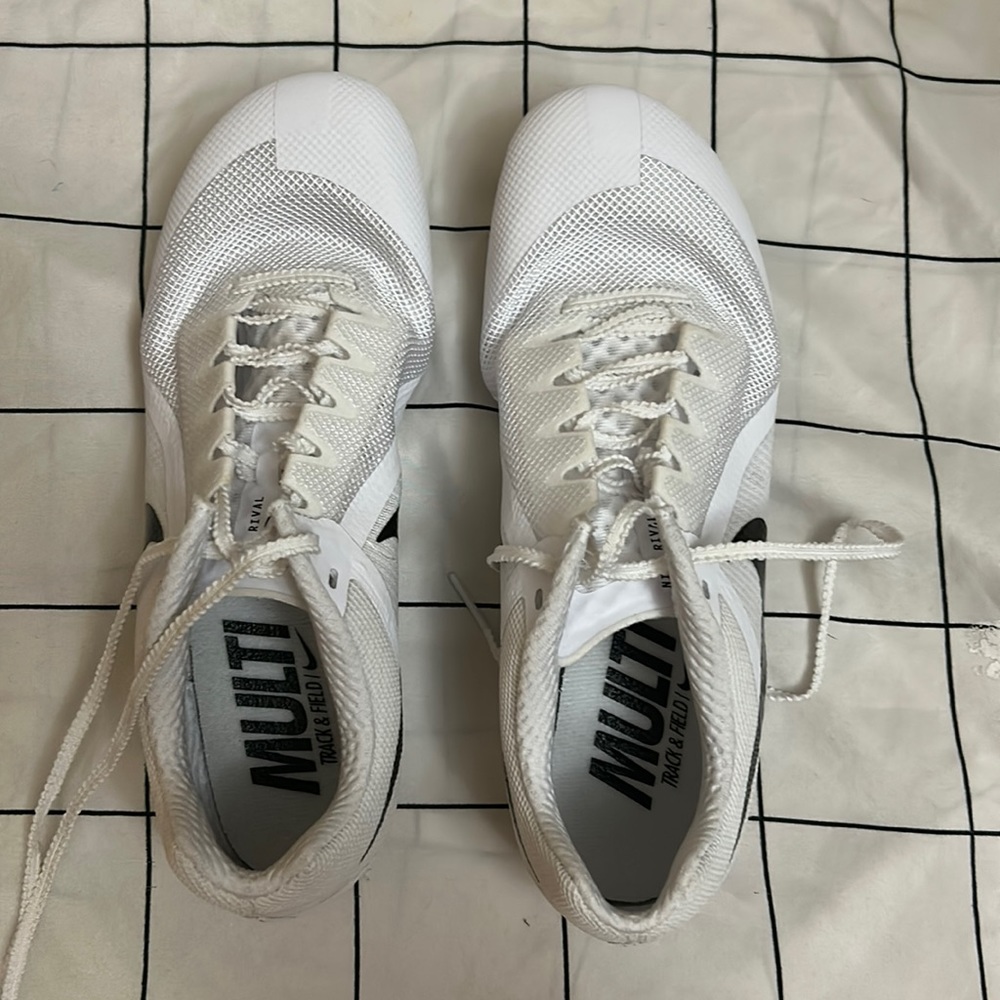 Nike white track shoes. Spike holes. Brand new never worn. Women 6.5